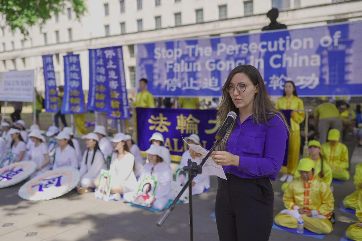 Victoria White, UK communications coordinator at The International Coalition to End Transplant Abuse in China, speaks at a rally highlighting the 23rd year of persecution in China against the spiritual discipline Falun Gong, in London on July 16, 2022. (Yanning Qi/The Epoch Times)