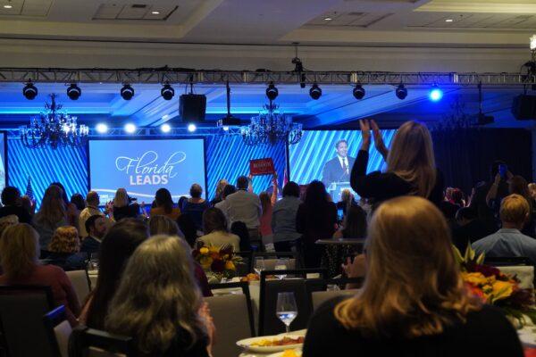 Attendees applaud Fla. Gov. Ron DeSantis' remarks at the first Moms for Liberty national conference in Tampa on June 15, 2022. (Natasha Holt/The Epoch Times)