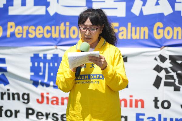 Hui Li, Falun Gong practitioner, speaks at a rally about her experience being persecuted by the CCP in Santa Monica, Calif. on July 17, 2022. (Debora Cheng/The Epoch Times)