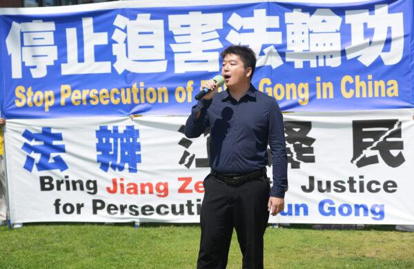 Tony Chen, award-winning musician and composer, sings at a rally to raise awareness of the CCP persecution of Falun Gong in Santa Monica, Calif. on July 17, 2022. (Debora Cheng/The Epoch Times)