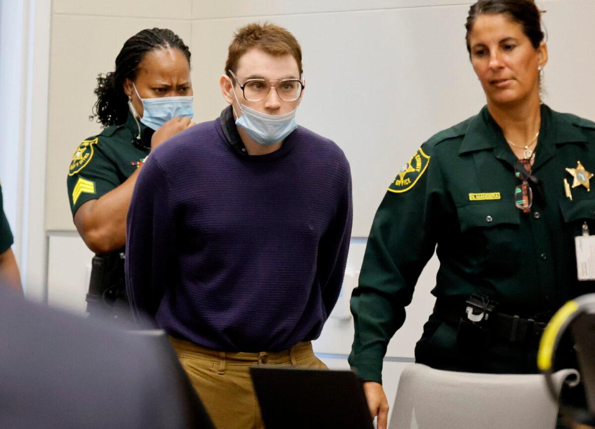 Marjory Stoneman Douglas High School shooter Nikolas Cruz is led into the courtroom during the penalty phase of his trial at the Broward County Courthouse in Fort Lauderdale, Fla., on July 25, 2022. (Carline Jean/South Florida Sun-Sentinel via AP, Pool)