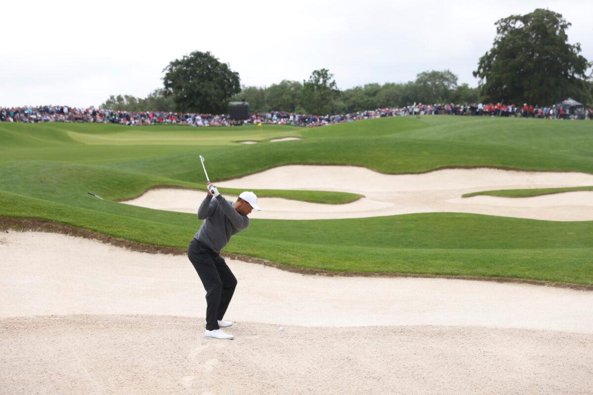 U.S golfer Tiger Woods plays out of the bunker on the 5th hole during the JP McManus Pro-Am at Adare Manor, Ireland, on July, 5, 2022. (Peter Morrison/AP Photo)
