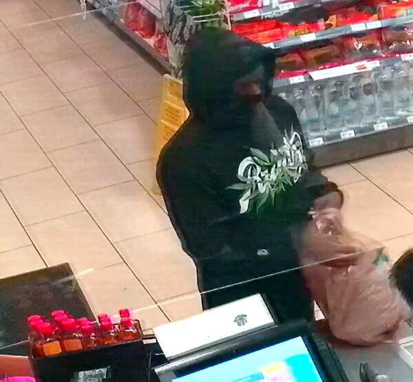 A person that police are attempting to identify in connection with two people who were killed and three who were wounded in shootings at four 7-Eleven locations in Southern California on July 11, 2022. (Upland Police Department via AP)