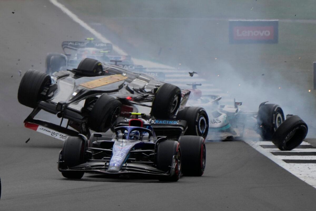 Alfa Romeo driver Guanyu Zhou of China crashes at the start of the British Formula One Grand Prix at the Silverstone circuit in Silverstone, England, on July 3, 2022. (Frank Augstein/AP Photo)