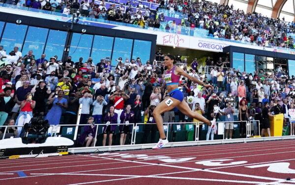 Sydney McLaughlin of the U.S. crosses the line to win the women's 400 meters hurdles final and set a world record on day eight of the World Athletics Championships Oregon22 at Hayward Field in Eugene, Ore., on July 22, 2022. (Pawel Kopczynski/Reuters)