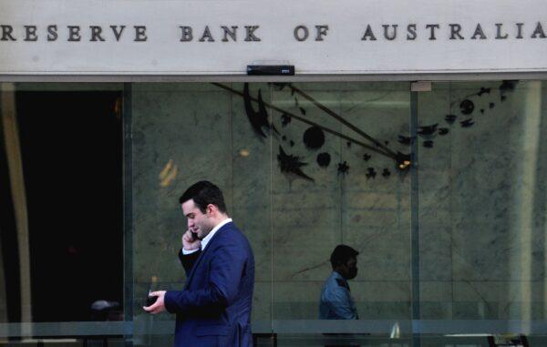 A man walks past the Reserve Bank of Australia in Sydney, Australia on June 7, 2022. (Muhammad Farooq/AFP via Getty Images)