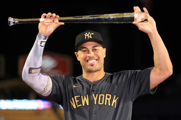 Giancarlo Stanton #27 of the New York Yankees poses with the Ted Williams MVP Award after the American League defeated the National League 3-2 during the 92nd MLB All-Star Game at Dodger Stadium in Los Angeles on July 19, 2022. (Sean M. Haffey/Getty Images)