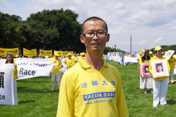 Arthur Zhang, a U.S. Air Force staff sergeant based in Florida and a Falun Gong practitioner, at the National Mall in Washington on July 21, 2022. (Lisa Fan/The Epoch Times)