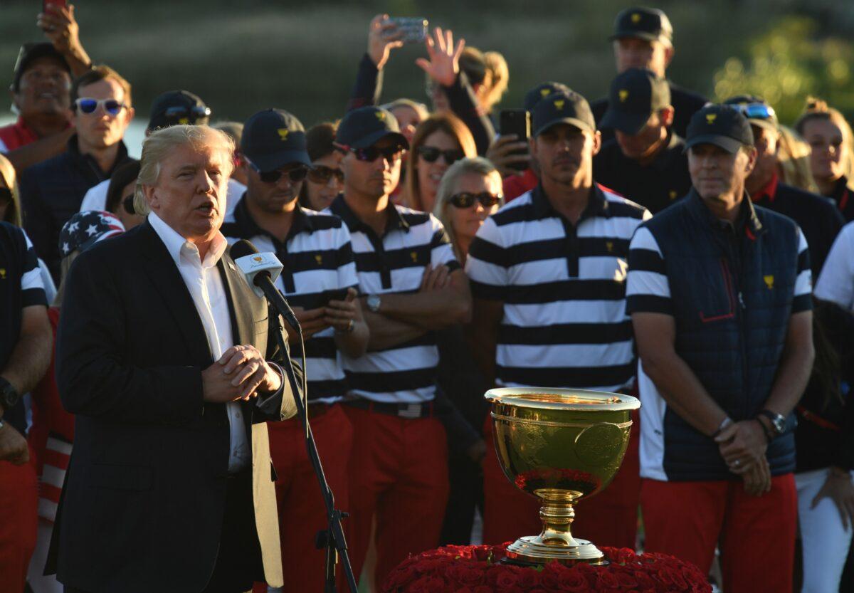 US President Donald Trump speaks during the trophy presentation of the Presidents Cup golf championship at Liberty National Golf Club in Jersey City, New Jersey, after the United States clinched its 10th Presidents Cup on October 1, 2017. (Nicholas Kamm/Getty Images)