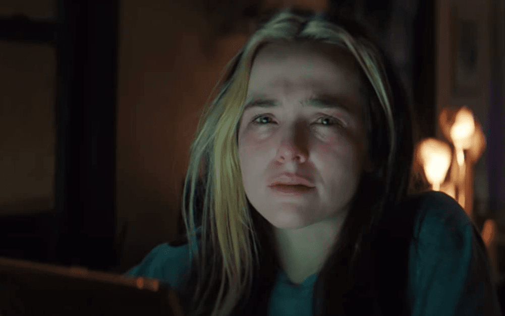 Danni (Zoey Deutch) seeing her online chickens coming home to roost in the form of massive cyberbullying, trolls, and an online audience that has the righteous moral high ground, in "Not Okay." Now she's really not okay. (Nicole Rivelli/Searchlight Pictures)