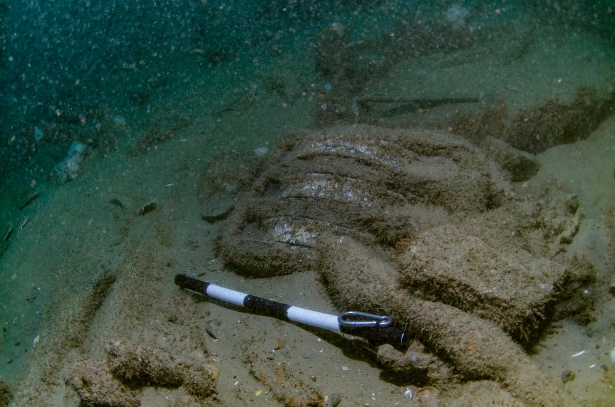 A pulley block exposed on the seabed, approximately 55 cm long. (Courtesy of Norfolk Historic Shipwrecks)