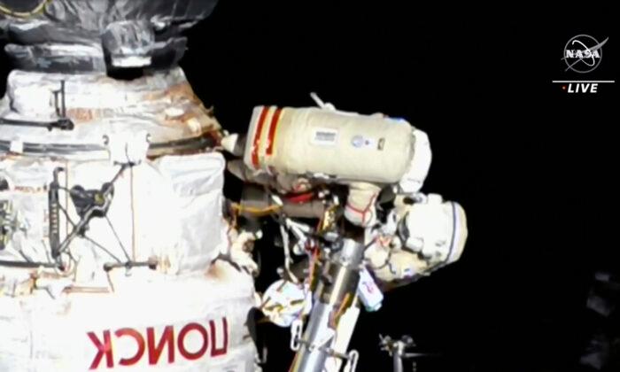 Italian, Russian Share Rare Spacewalk Amid Ukraine Tensions