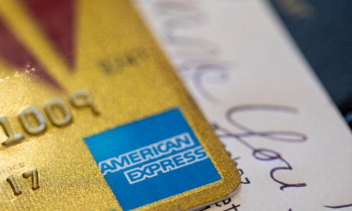 American Express 2Q Profits Fall 14 Percent Despite Higher Cardmember Spending
