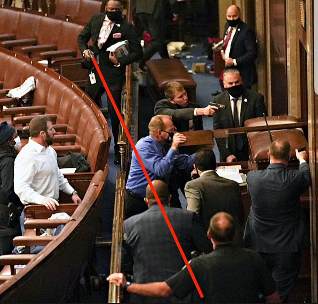 Capitol Police Lt. Michael Byrd had his Glock pistol drawn and pointed in the direction of U.S. Rep Troy Nehls (R-Texas) on Jan. 6, 2021. Photo illustration courtesy of Aaron Babbitt)