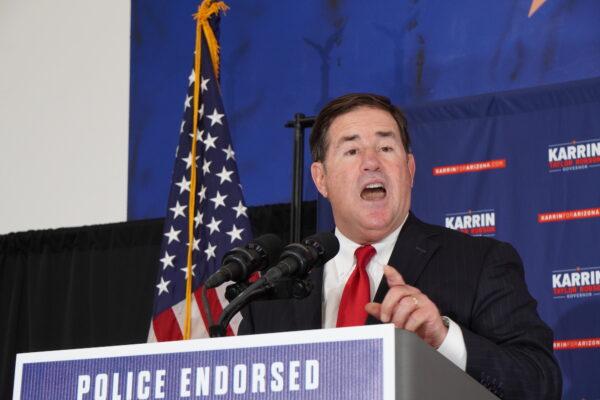 Outgoing Arizona Gov. Doug Ducey stumps for support of Karrin Taylor Robson's campaign for governor at an event in Peoria, Ariz., on July 22, 2022. (Allan Stein/The Epoch Times)