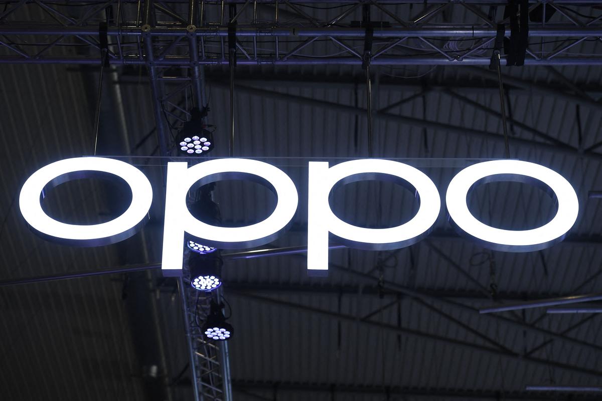 The logo of smartphone manufacturer Oppo is displayed at the MWC (Mobile World Congress) in Barcelona on March 2, 2022. (Josep Lago/AFP via Getty Images)