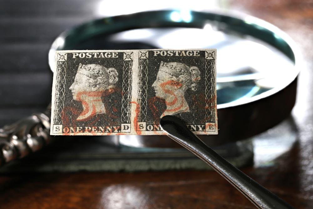 As is the case with any expensive asset being considered for purchase, it's wise to have an expert confirm the authenticity and condition of the stamp prior to transferring funds. (Bjoern Wylezich/Shutterstock)