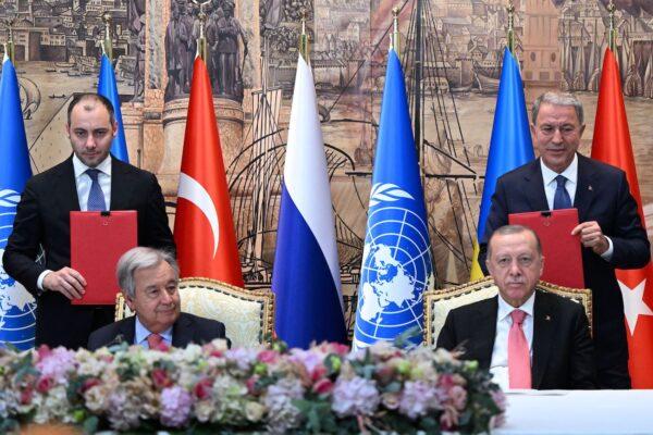 (L-R): Minister of Infrastructure of Ukraine Oleksandr Kubrakov, United Nations Secretary-General Antonio Guterres, Turkish President Recep Tayyip Erdogan and Turkish Defence Minister Hulusi Akar attend a signature ceremony of an initiative on the safe transportation of grain and foodstuffs from Ukrainian ports, in Istanbul, on July 22, 2022. (Ozan Kose/AFP via Getty Images)
