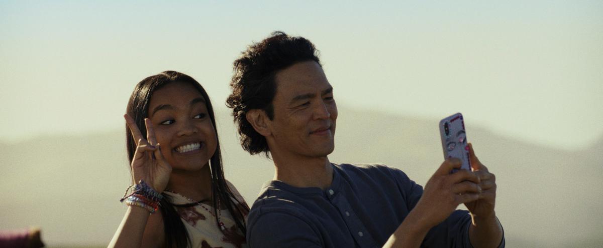 Wally (Mia Isaac) and Max (John Cho) take another selfie in "Don't Make Me Go." (Amazon Studios)
