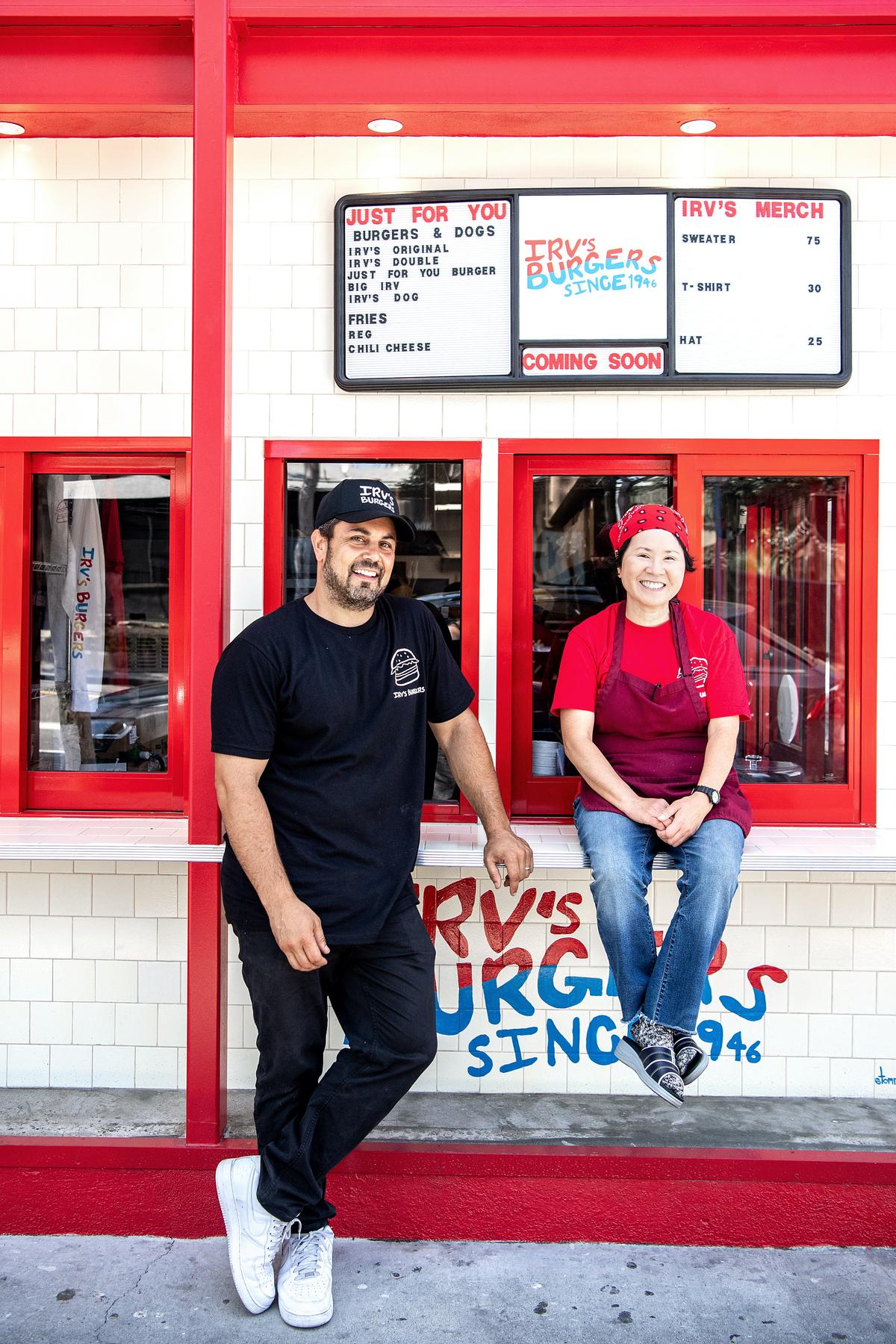 Lawrence Longo, left, approached former Irv’s owner Sonia Hong with an offer to help her reopen the business. She’d only return if she wasn’t the owner, she told him. (Mariah Tauger/Los Angeles Times/TNS)