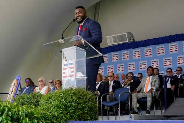 Hall of Fame inductee David Ortiz, formerly of the Boston Red Sox baseball team, speaks during the National Baseball Hall of Fame induction ceremony, at the Clark Sports Center in Cooperstown, N.Y., on July 24, 2022. (John Minchillo/AP Photo)