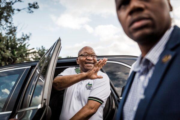 Former South African President and former president of the ruling party African National Congress (ANC) Jacob Zuma (C) waves to supporters as he arrives for a short visit in Shakaskraal township, on April 16, 2019. (Rajesh Jantilal/AFP via Getty Images)