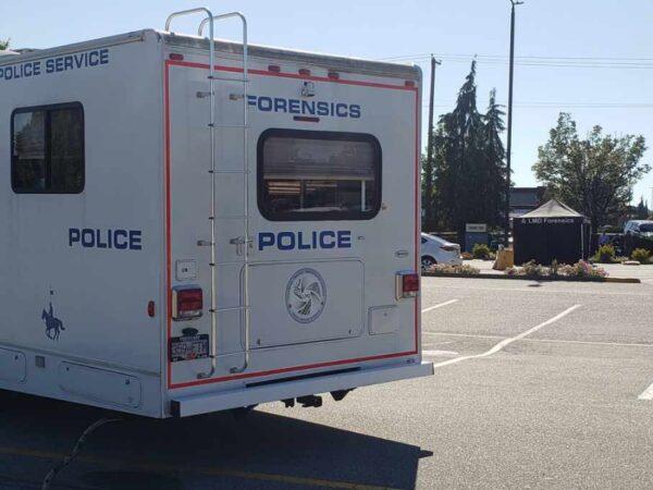 A police forensics unit vehicle at the site of the shootings in Langley on July 25, 2022. (Jeff Sandes/The Epoch Times)