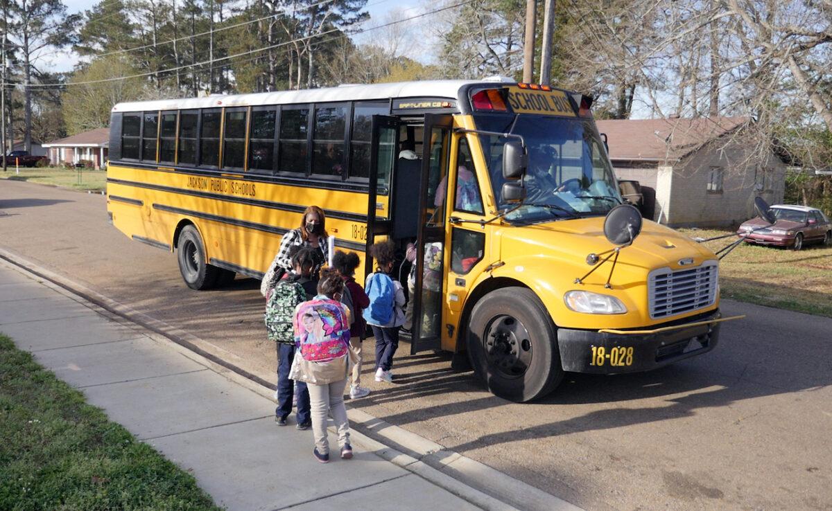 Children leave Wilkins Elementary school in in Jackson, Miss., on March 24, 2022. (Francois Picard/AFP via Getty Images)