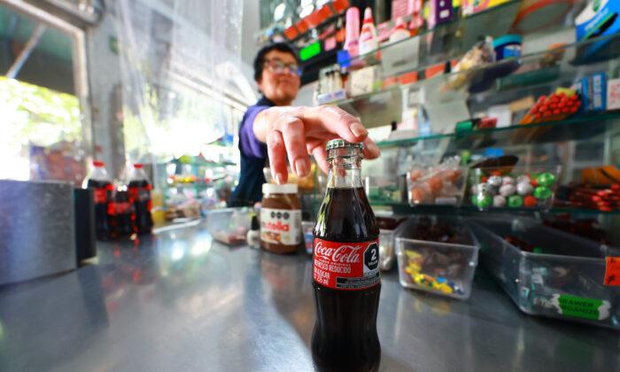 Coca-Cola Boosts Annual Revenue Forecast After Unexpected Surge in Demand
