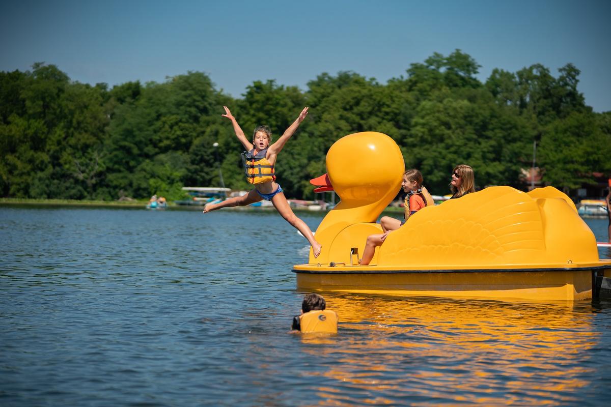 A child enjoys cooling off in the lake. (Focal Flame Photography/Courtesy of Destination Madison)