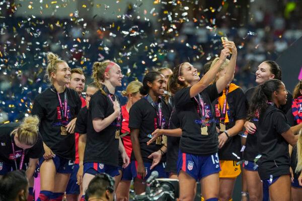 United States' Alex Morgan takes a selfie as she celebrates after winning the CONCACAF Women's Championship final soccer match against Canada in Monterrey, Mexico, Monday, July 18, 2022. (Fernando Llano/AP Photo)