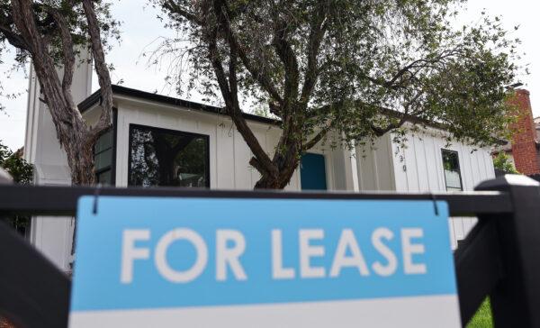 A "For Lease" sign is posted outside a house available for rent in Los Angeles on March 15, 2022. (Mario Tama/Getty Images)