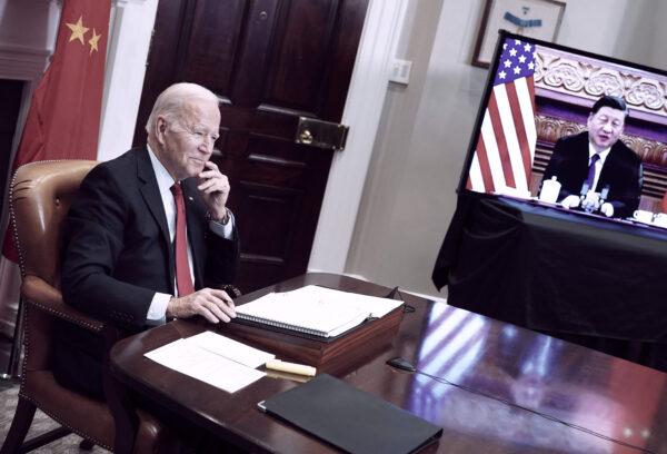 U.S. President Joe Biden meets with China's leader Xi Jinping during a virtual summit from the Roosevelt Room of the White House in Washington on Nov. 15, 2021. (Mandel Ngan/AFP via Getty Images)