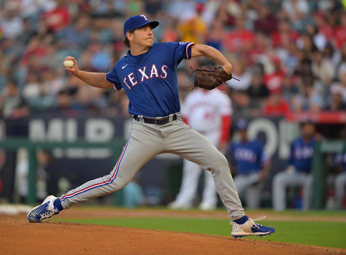 Spencer Howard #31 of the Texas Rangers pitches in the first inning against the Los Angeles Angels at Angel Stadium of Anaheim in Anaheim, Calif., on July 28, 2022. (Jayne Kamin-Oncea/Getty Images)