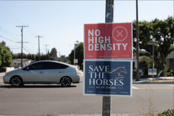 Signs hang in opposition to proposed locations city officials are considering to zone for housing in Yorba Linda, Calif., on July 27, 2022. (John Fredricks/The Epoch Times)