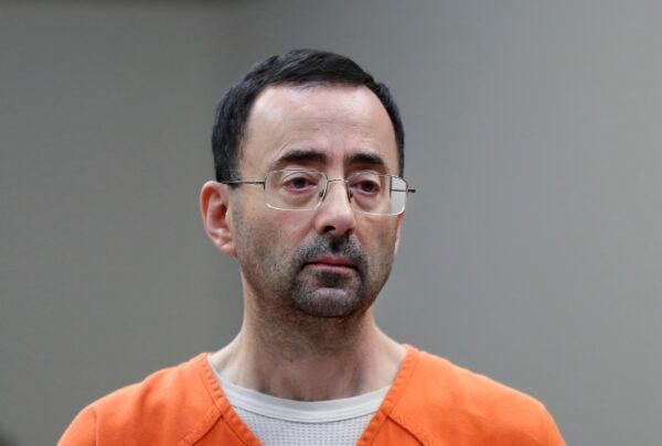 Dr. Larry Nassar appears in court for a plea hearing on Nov. 22, 2017, in Lansing, Mich. (AP Photo/Paul Sancya)