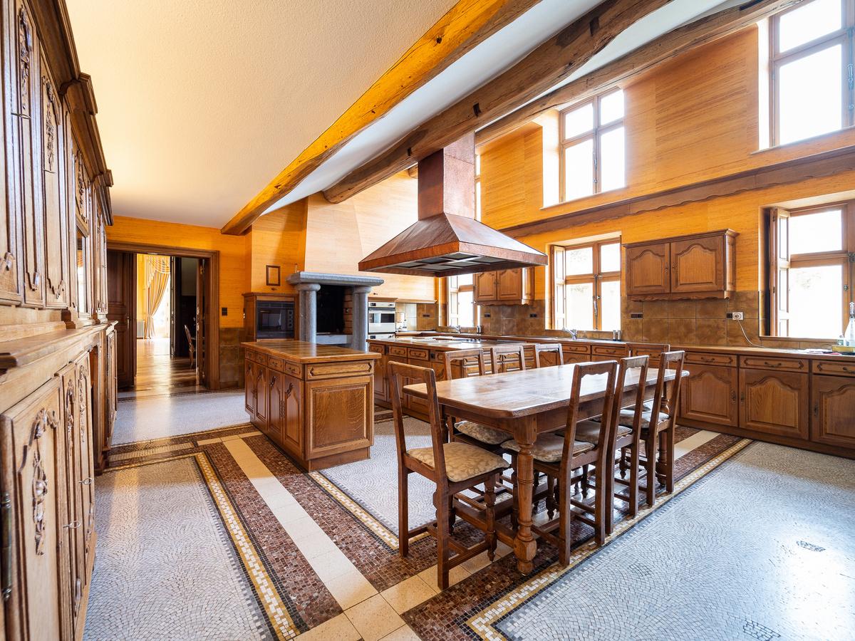 The live-in kitchen will please even the most particular chef. Accessed via a separate entrance, it features a wide array of appliances. (Courtesy of Belgium Sotheby’s International Realty)