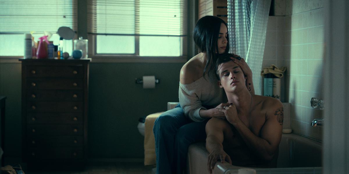 Cassie (Sophia Carson) and Luke (Nicholas Galitzine) experiencing even more unexpected zing, in "Purple Hearts." (Netflix)