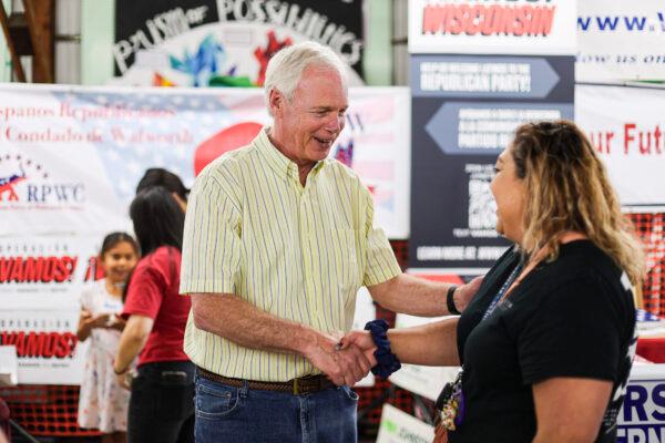 U.S. Senator Ron Johnson (R-Wis.) speaks with a supporter at a Hispanic voter event in an undated photo during his 2022 reelection campaign. (Courtesy of Ron Johnson for Senate)