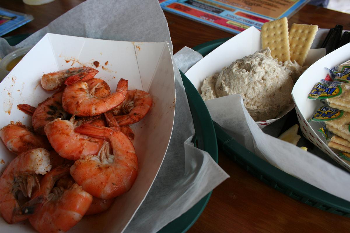 Seafood restaurants dot the length of A1A from Amelia Island and Fernandina to Miami and Key West, where the highway merges with U.S. 1. At High Tides at Snack Jacks in Flagler Beach, the spicy, steamed shrimp is a favorite menu item. (Mary Ann Anderson/TNS)