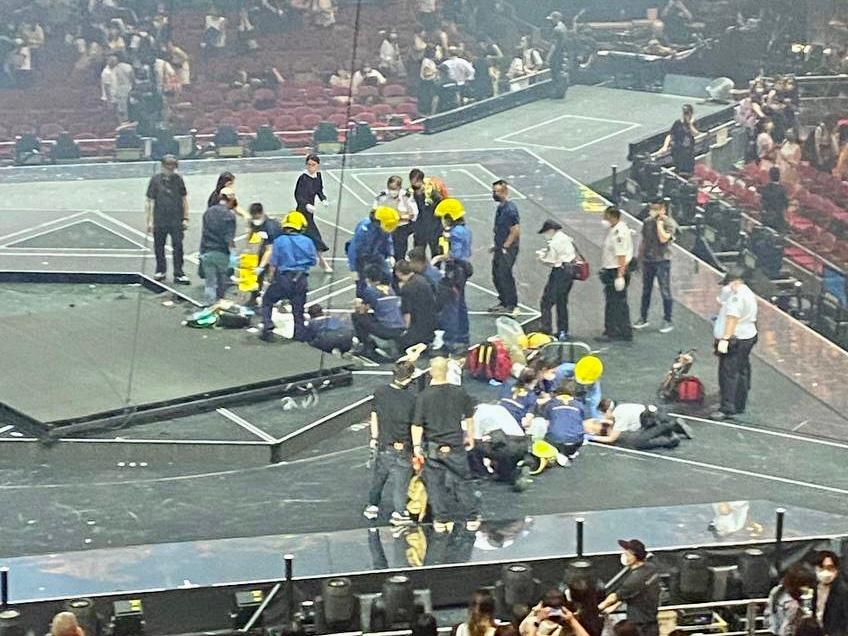 Hong Kong Fire Department and EMT arrived to treat the injured dancers at Mirror We Are Concert in Hong Kong on Jul 28, 2022. (Big Mack/The Epoch Times)