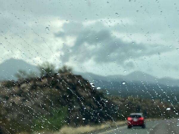 A gusting rainstorm greets motorists on their way to Las Vegas on July 29. (Allan Stein/The Epoch Times)