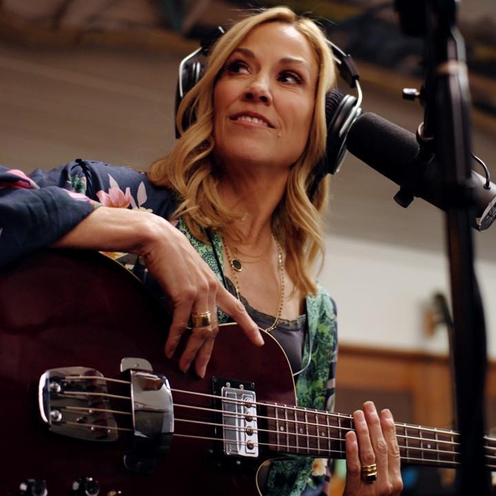 Sheryl Crow on bass, in "Sheryl." Crow plays acoustic, electric, pedal steel, and bass guitars, piano, accordion, and harmonica. (Showtime)