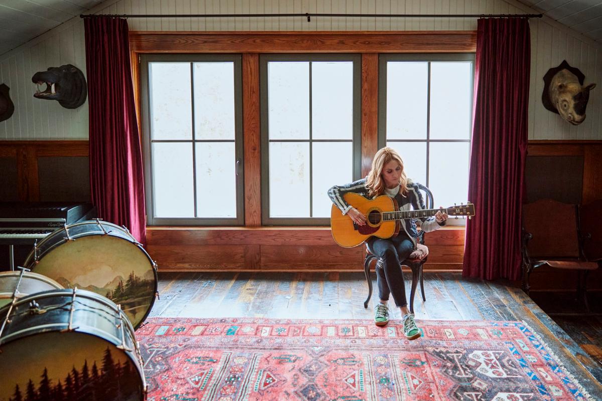Sheryl Crow on acoustic guitar in her studio in "Sheryl." (Showtime)