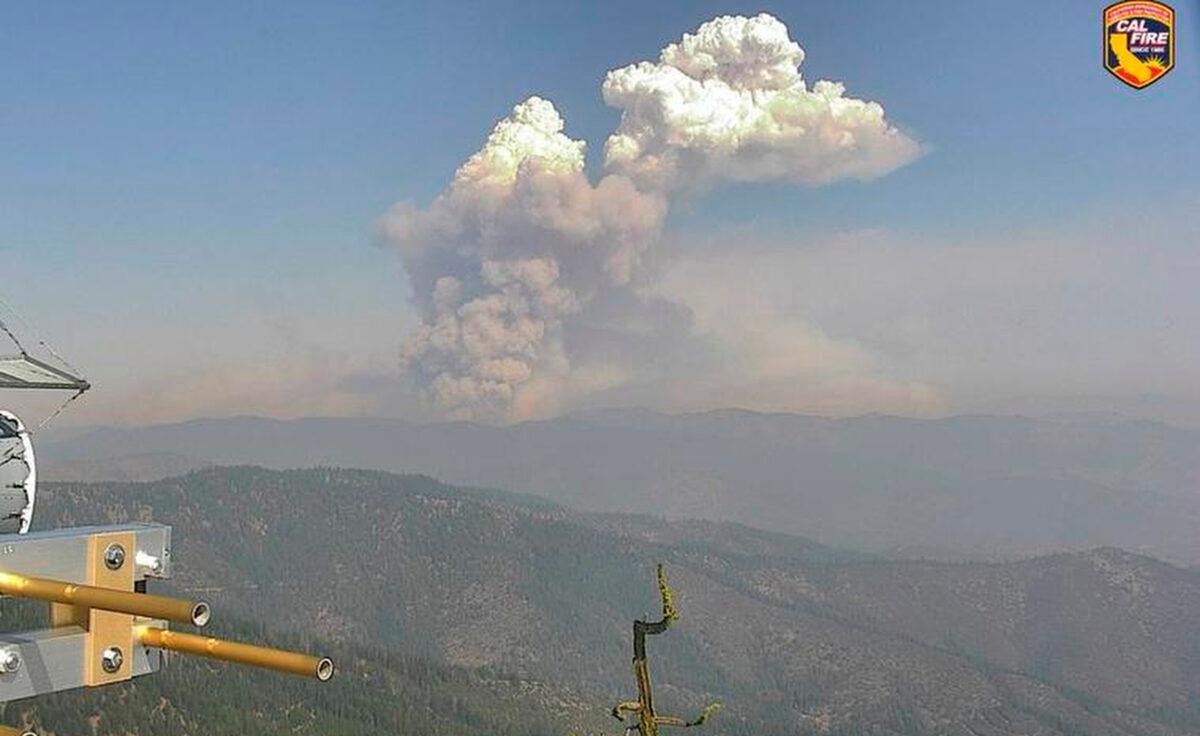 The McKinney Fire burns in Siskiyou County, Calif., as seen from the Antelope Mountain Yreka 1 observation camera, early on July 30, 2022. (Cal Fire via AP)
