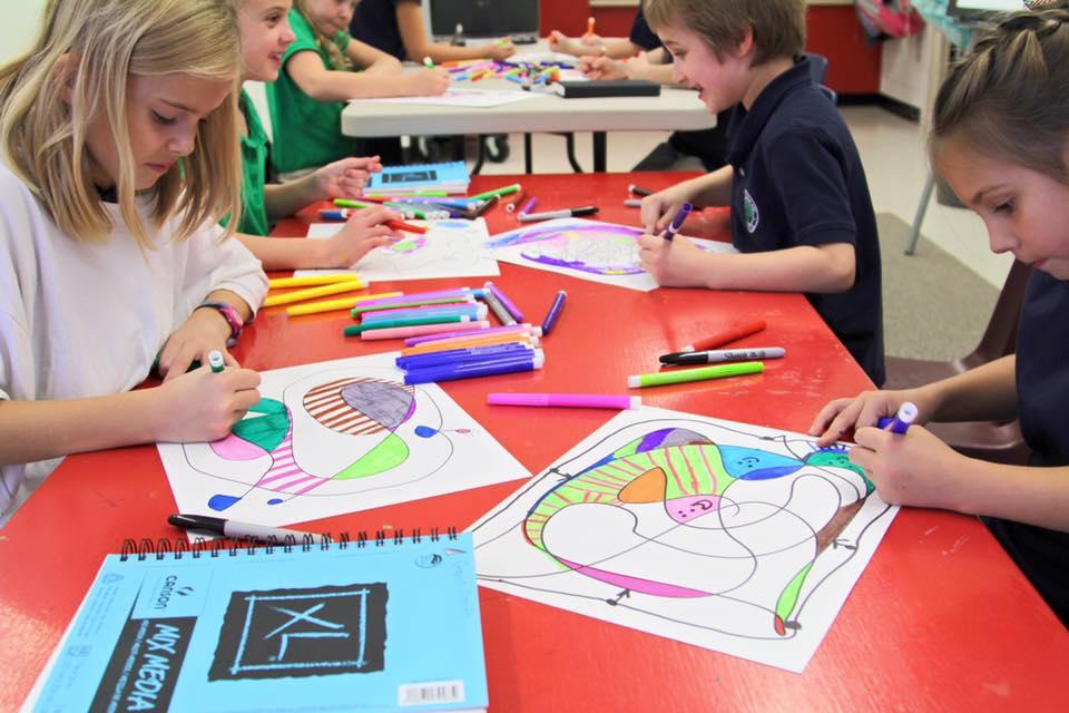 Students get creative at Covenant Christian Academy in Warrenton, Va., during an arts and craft session. (Courtesy of NAUMS. Inc)