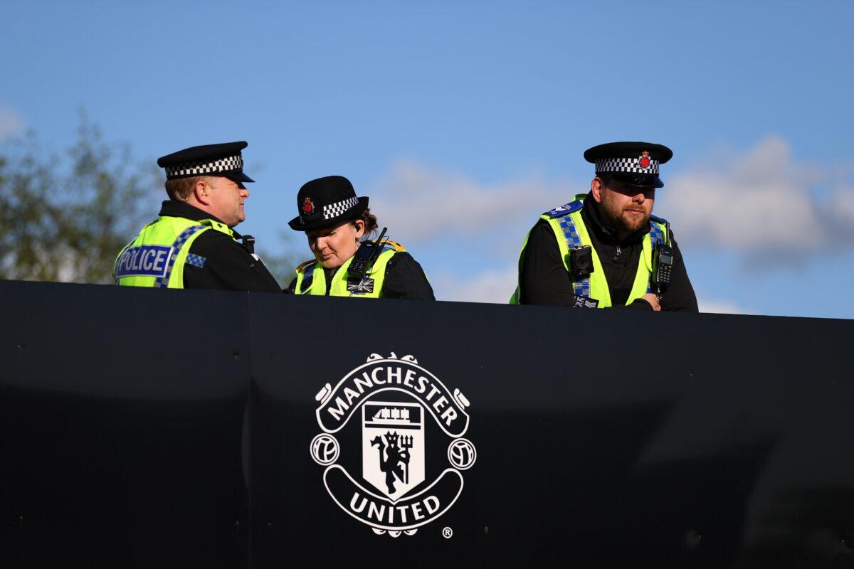Police are seen outside the stadium ahead of the FA Youth Cup Final match between Manchester United and Nottingham Forest at Old Trafford in Manchester, England, on May 11, 2022. (Naomi Baker/Getty Images)