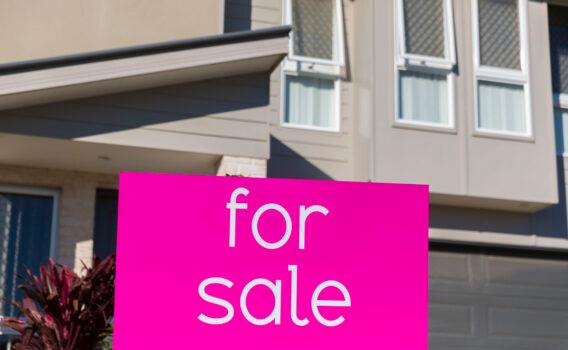Property sales signage is displayed in North Lakes in Brisbane, Australia, on June 10, 2016. (Glenn Hunt/Getty Images)