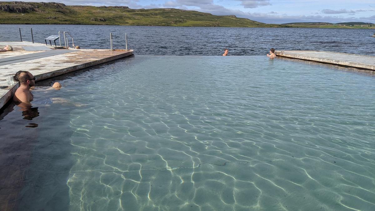 At the Vok Baths, you can warm up in the floating geothermal pool before jumping into cool Lake Urridhavatn. (Simon Peter Groebner/Minneapolis Star Tribune/TNS)