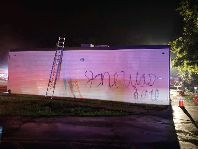 Damage at the CompassCare pregnancy center in Amherst, N.Y. Its windows were shattered and fires set inside early on June 7, 2022. Spray-painted on one wall was the message "Jane was here." An pro-abortion group called Jane's Revenge took credit for the attack. (Dan Berger/The Epoch Times)